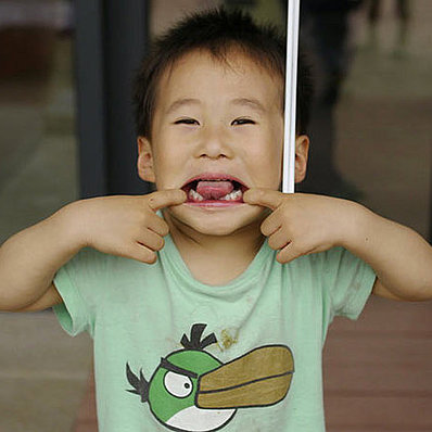 Chinese boy makes a grimace